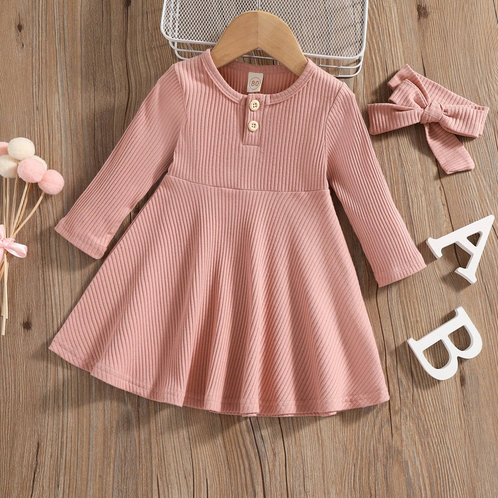 Geribbelde midi-jurk met lange mouwen en knoopsluiting (voor kinderen): ROZE